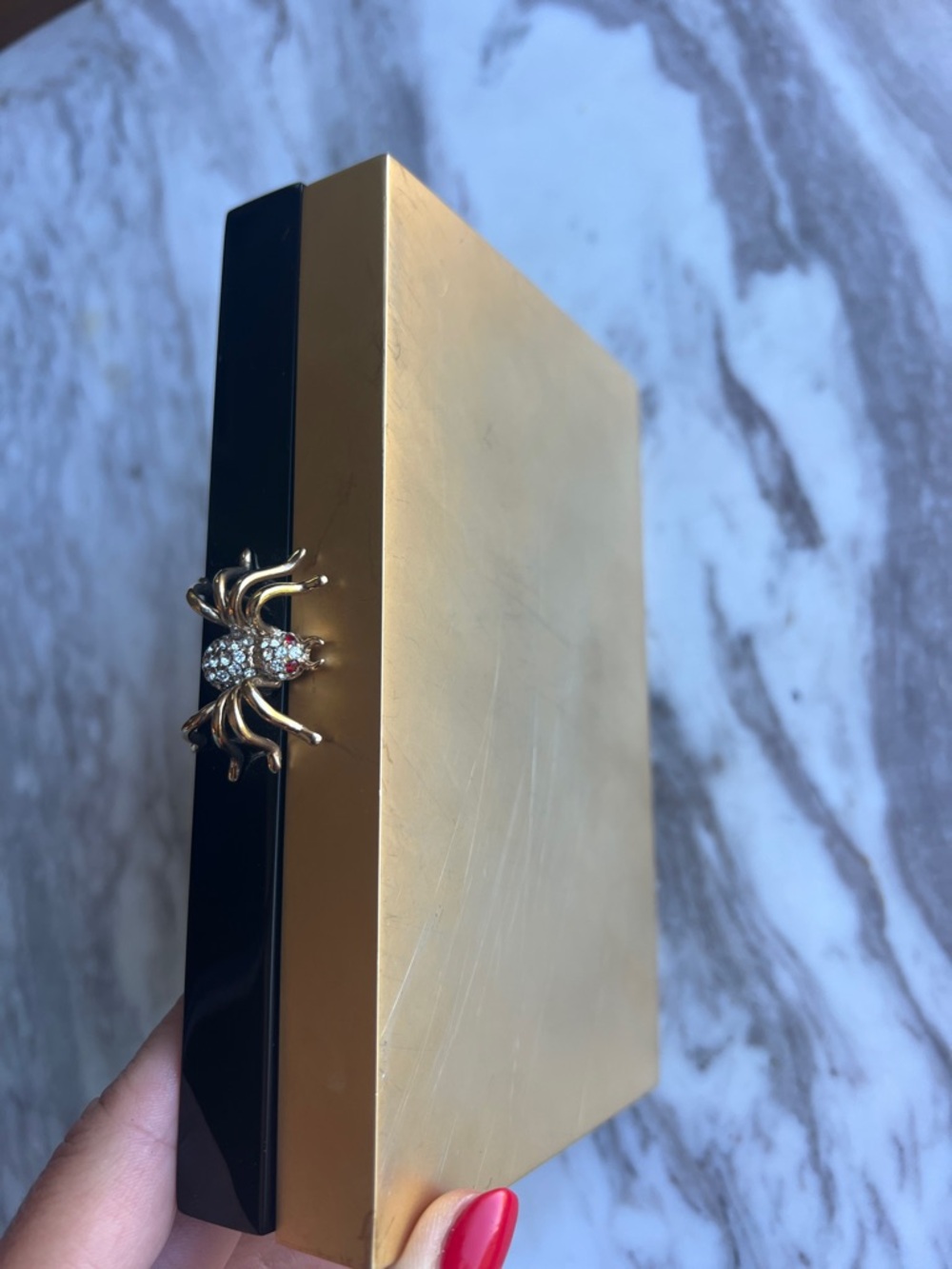 Charlotte Olympia  Spider Clutch with Gold  and black Accent